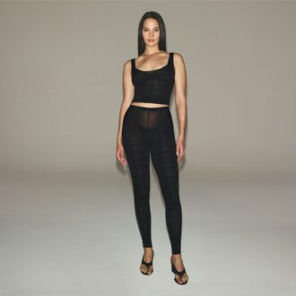 MÆLKEDE TRANSPARENT TOP