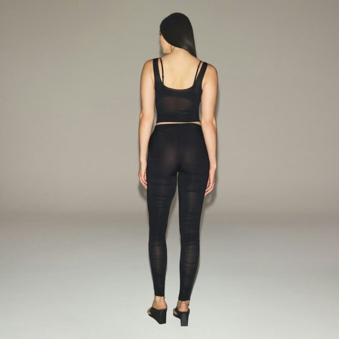 MÆLKEDE TRANSPARENT TOP