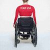 SKIMS TIL TEAM USA SIGNATURE SVØMNING PARALYMPISK LANGERMET CROPPET T-SHIRT