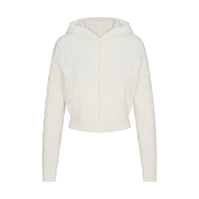 STRIKKET SWEATER MED KRYMPEDE LYNLÅS-HÆTTETRÆTTE